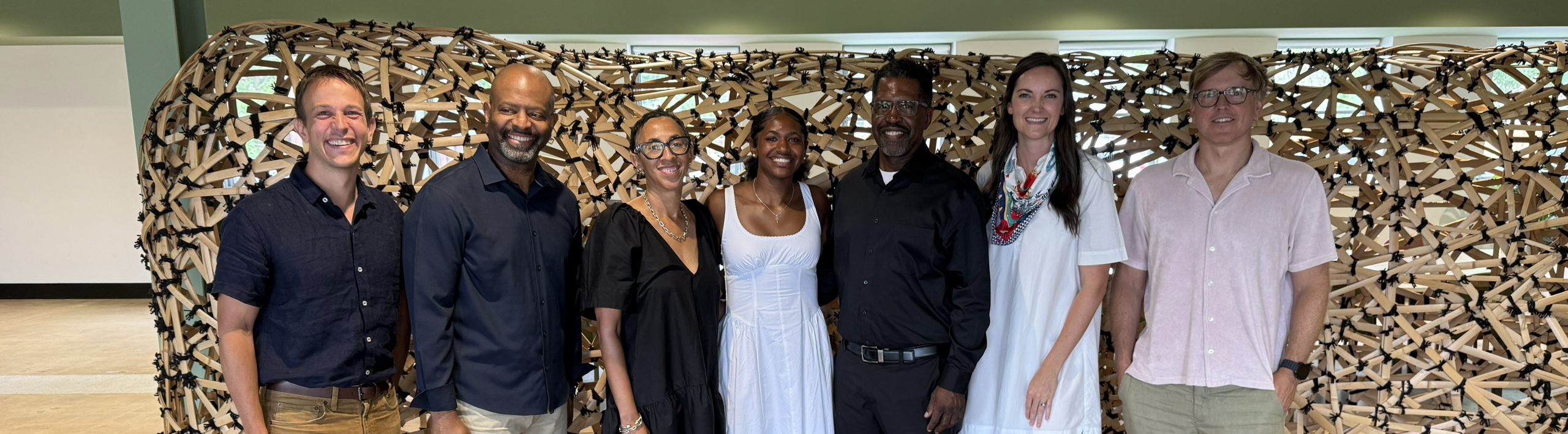 Sidney Cobbs, 2026 AIA Richmond scholarship recipient with family and committee members.